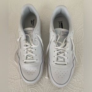 Almost brand new. Worn twice and felt they were too small.